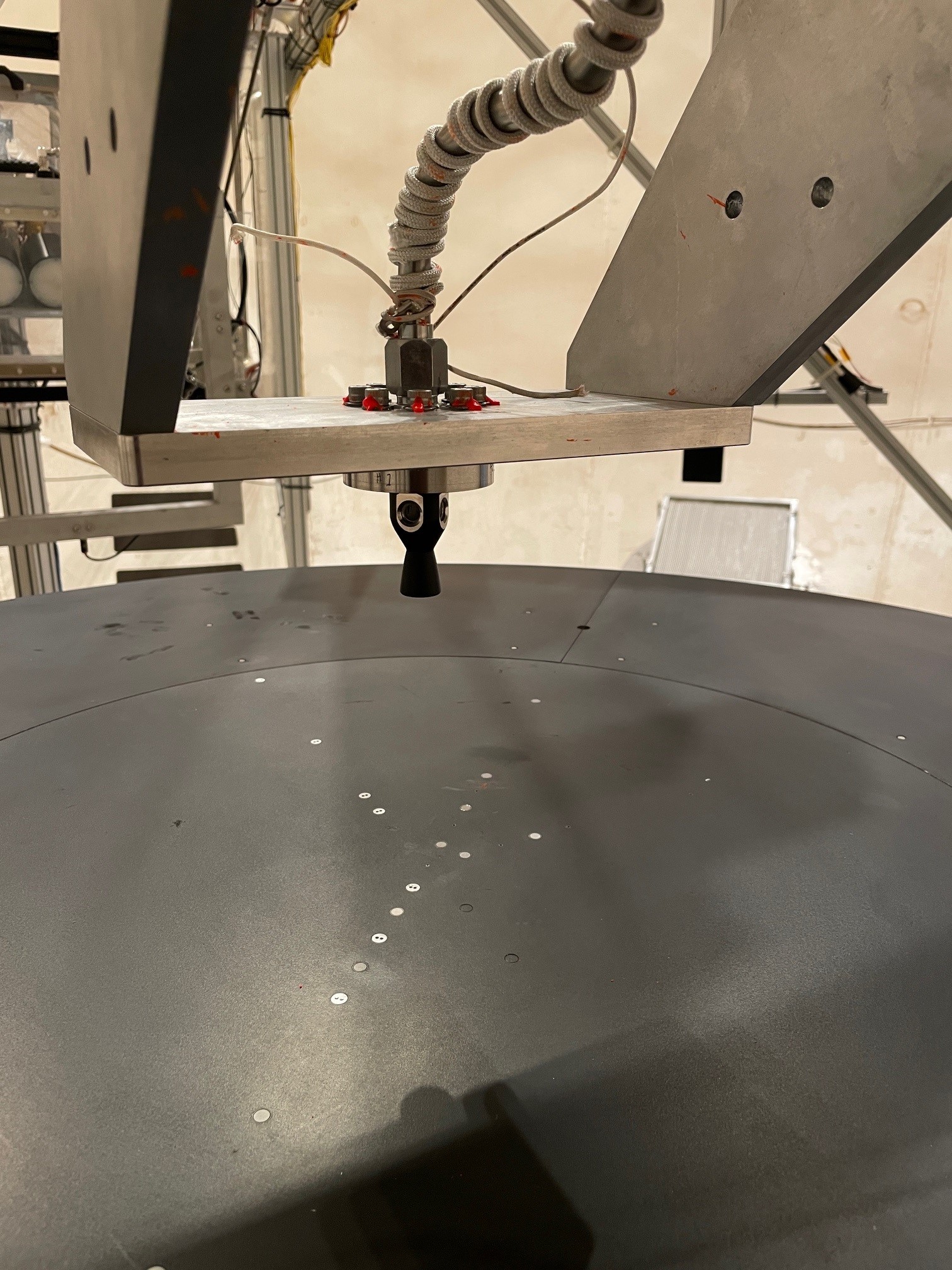 Views of the 60-foot vacuum sphere in the which the plume-surface interaction testing is happening.